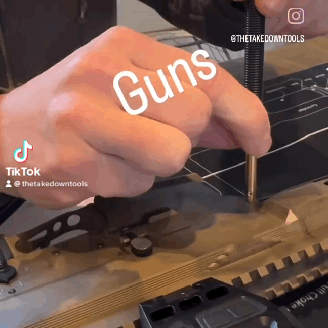 GIF showing the AR-Takedown Tool being used to push out a pin on an AR-platform rifle during disassembly.